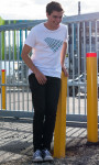 Model wearing Lonely Goat Mens' Odyssey-Signature Fit Tee-Cotton Soft-Milk